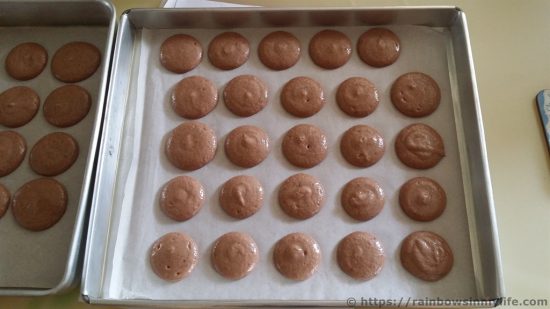 Chocolate Macarons - piped out!